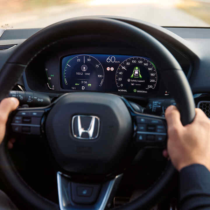 Close up of Honda civic hybrid instrument cluster.
