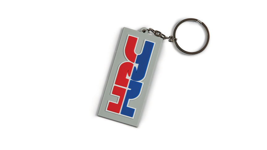 Sivý krúžok na kľúče Honda HRC v tímových farbách HRC a s logom Honda Racing Corporation.